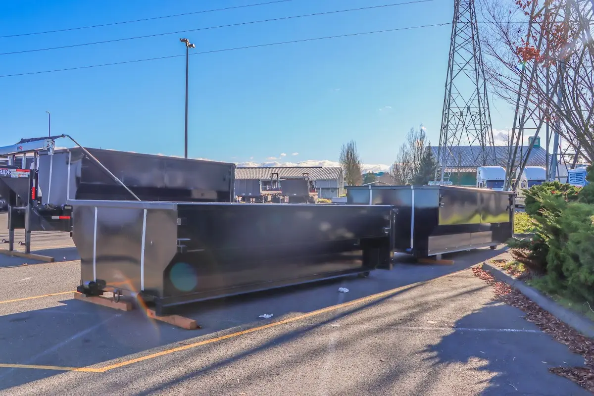 Roll-off dumpster ready for waste disposal at job site for Roofing Dumpster Rental in Madison